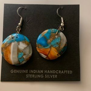 Genuine handcrafted sterling, silver earrings.